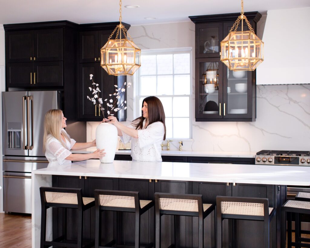 Renovated modern kitchen with black cabinets