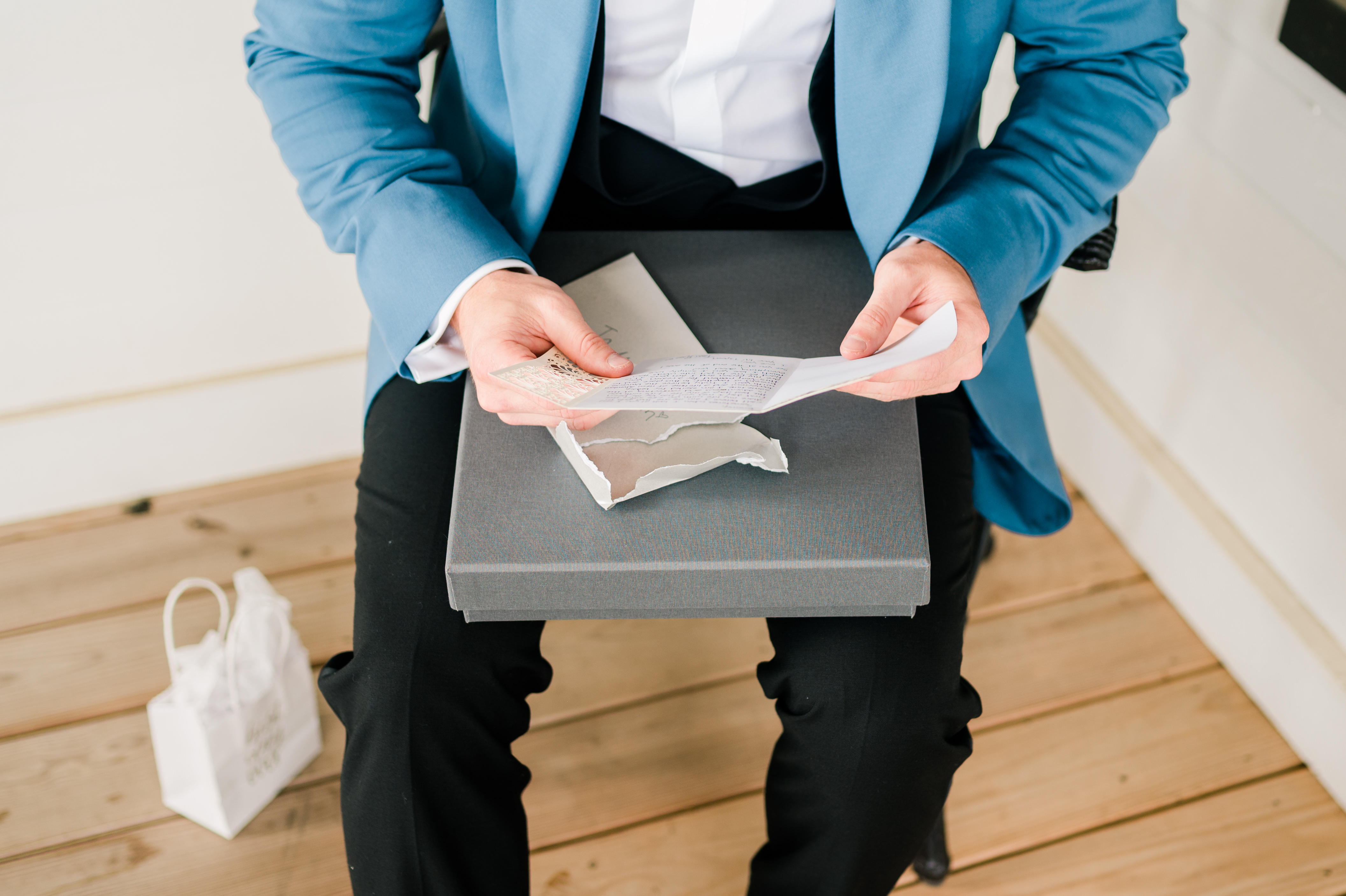 Groom opening card