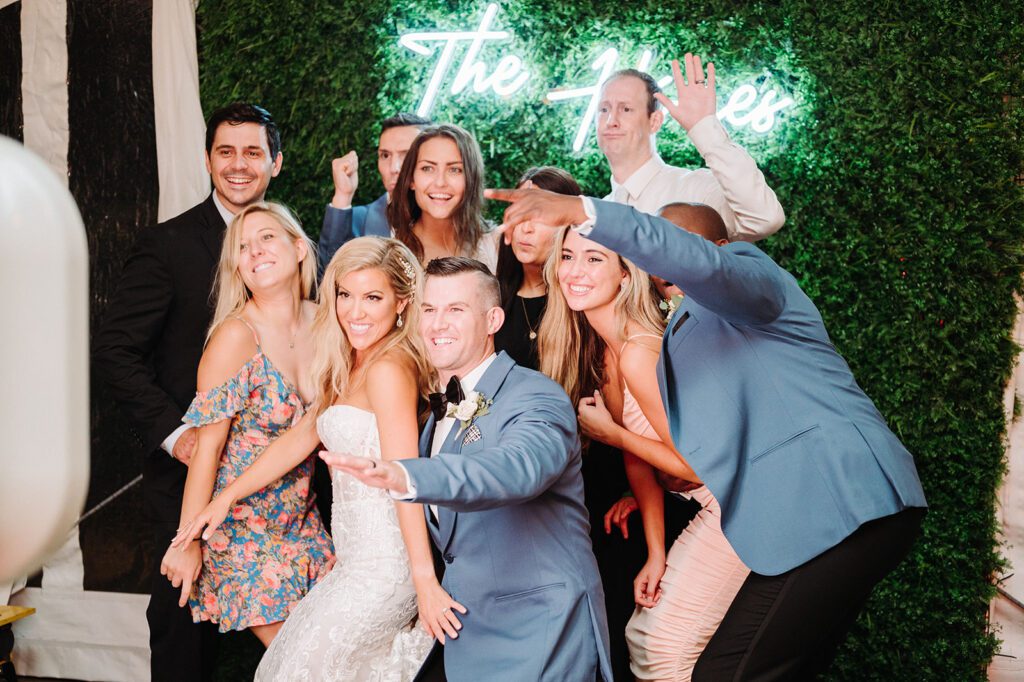 Wedding guests in photo booth