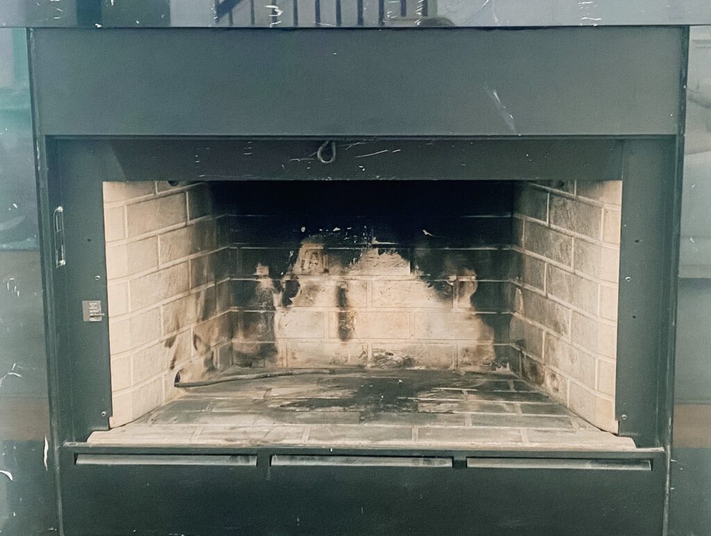 Wood Fireplace with soot marks