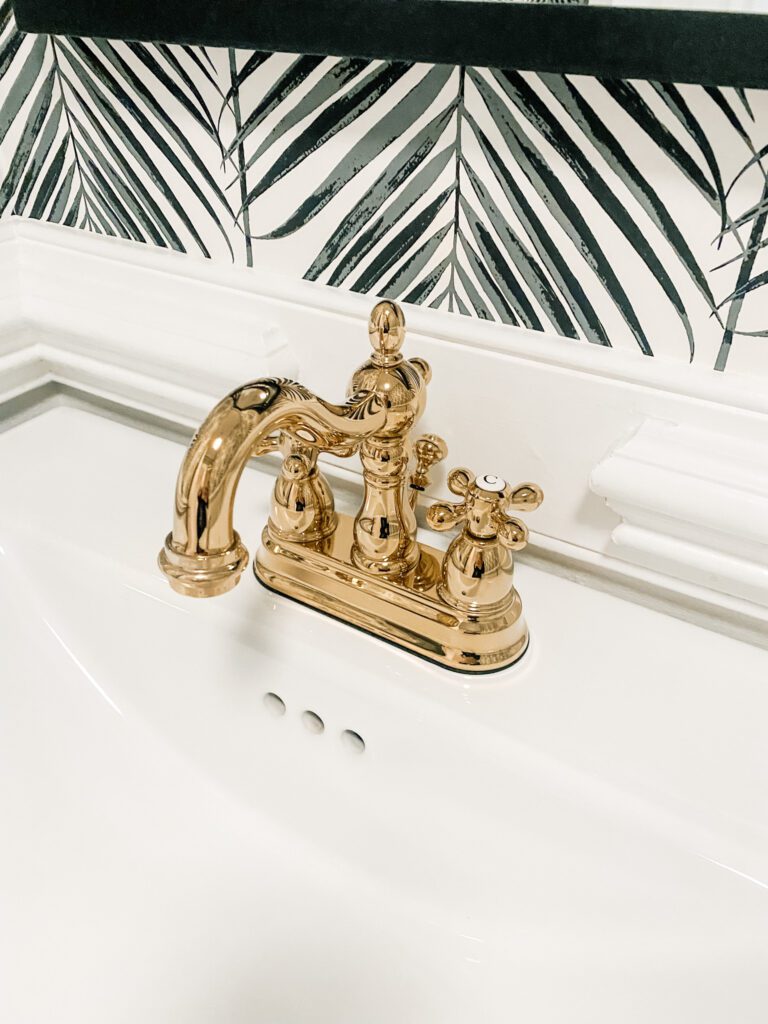 Polished brass bathroom faucet