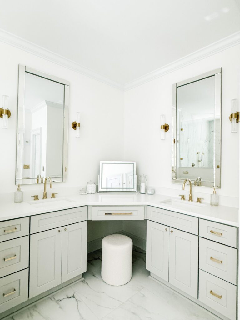 Modern Glam Luxury Bathroom vanity, Sconces and Polished Brass Cabinet Hardware