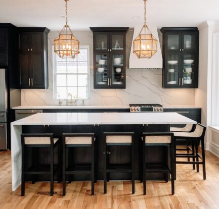 Modern Vintage Kitchen - Black cabinets brass fixtures