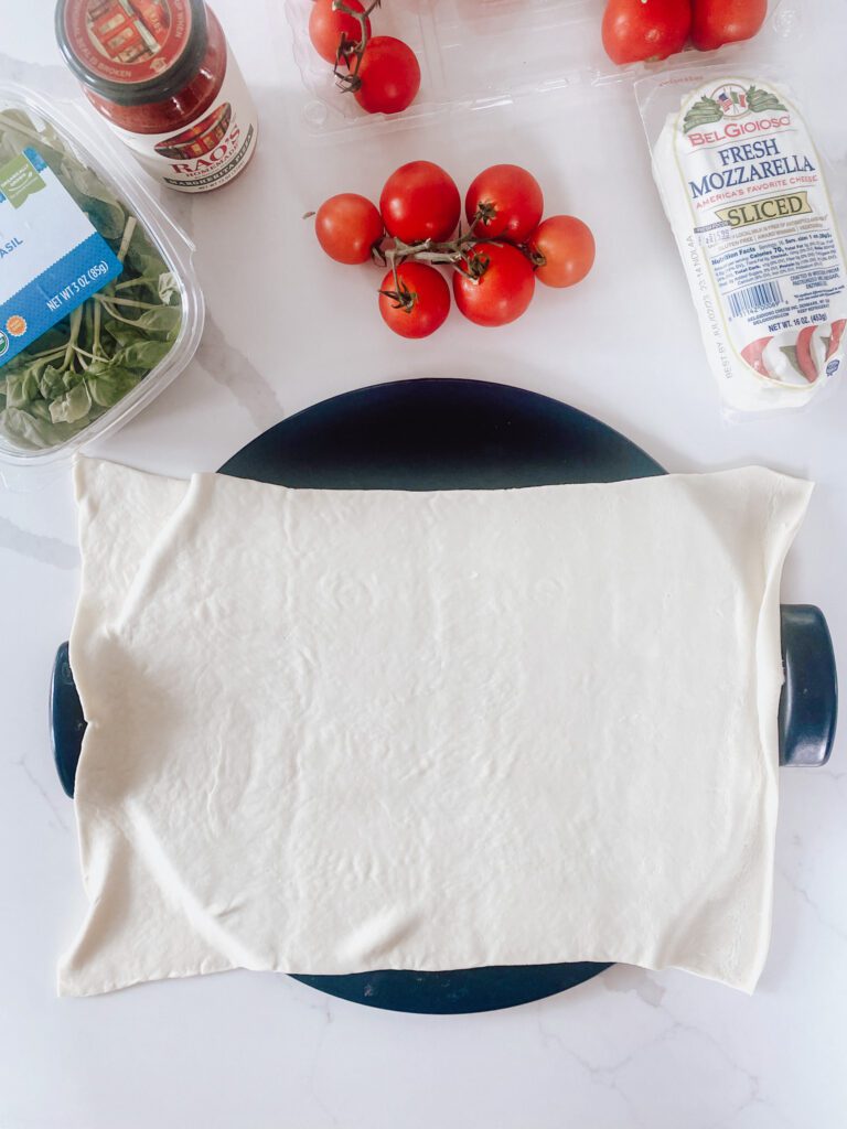 Pizza dough on pizza stone