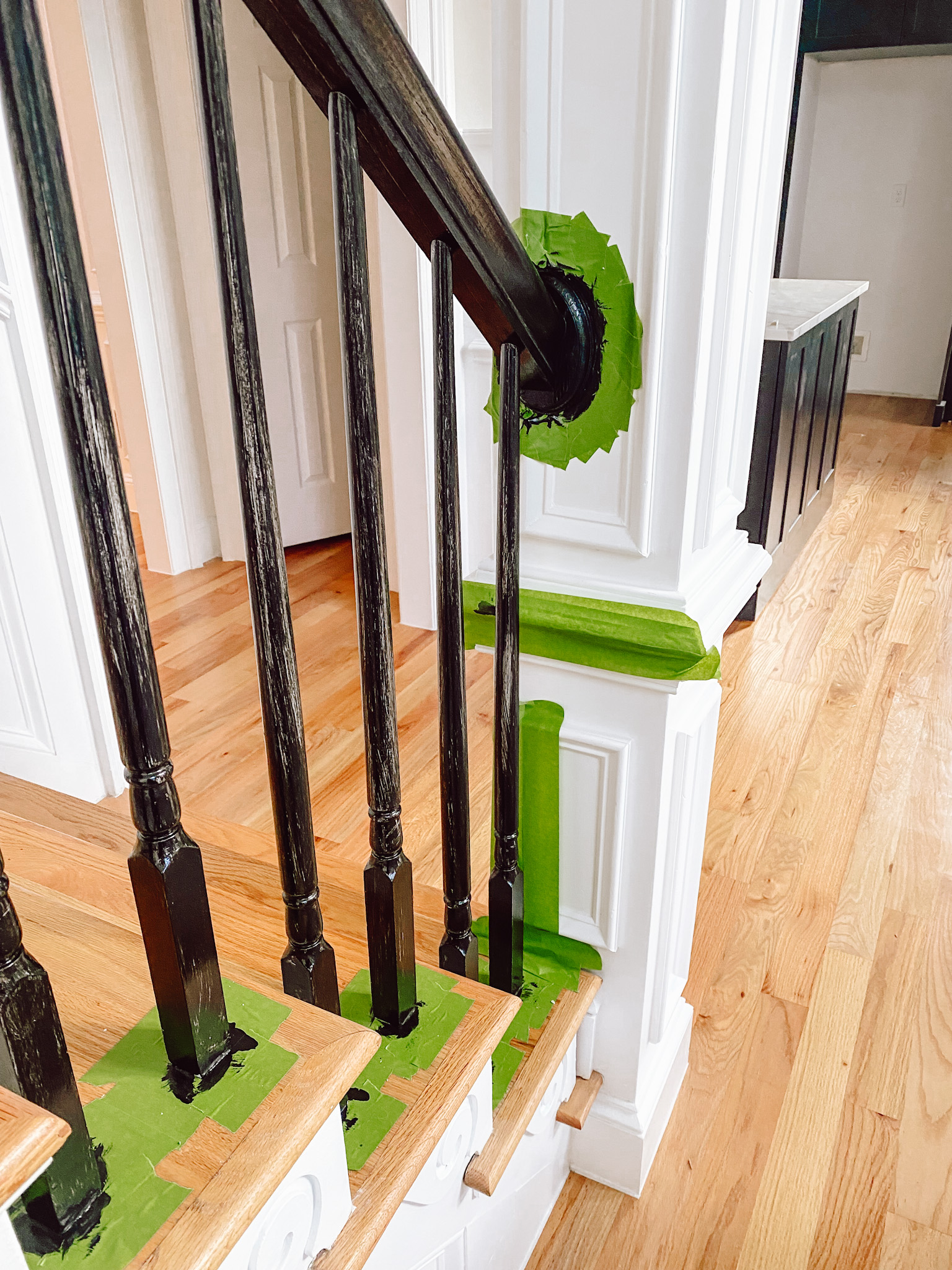 Black Painted Railing with green painters tape