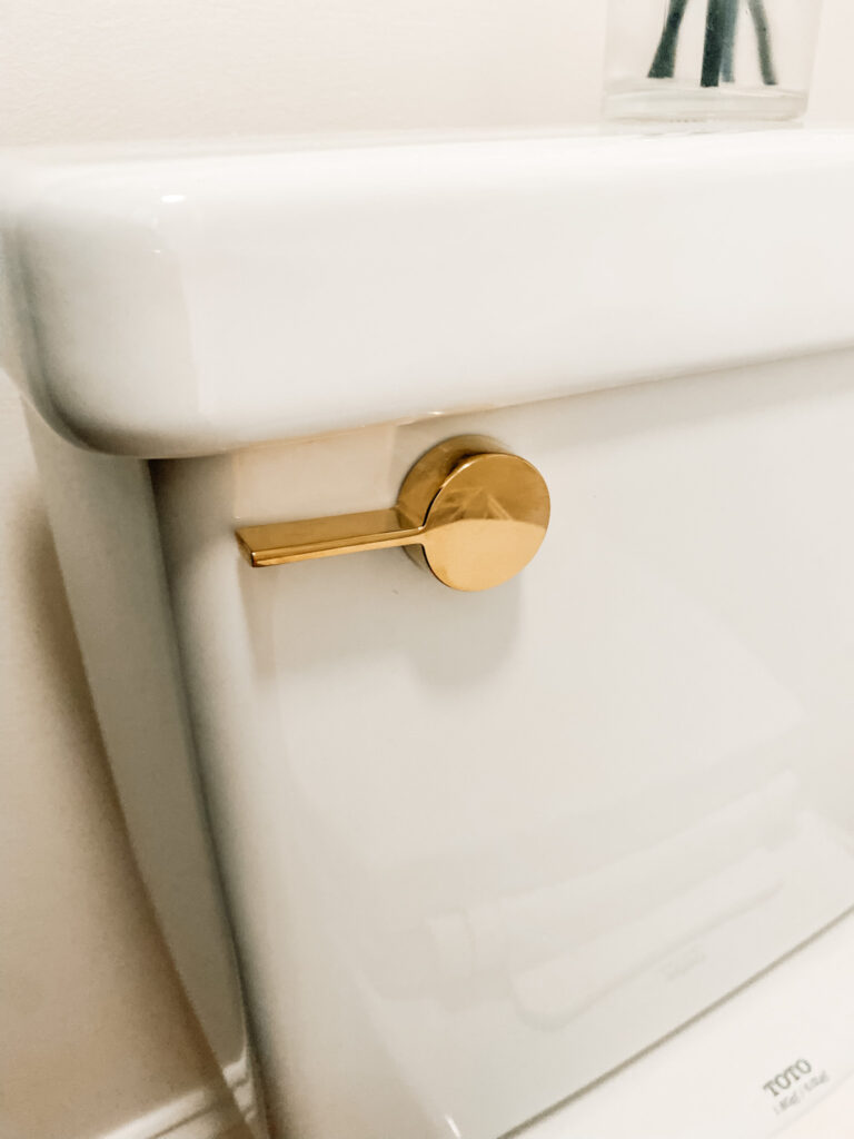 Polished brass toilet handle lever