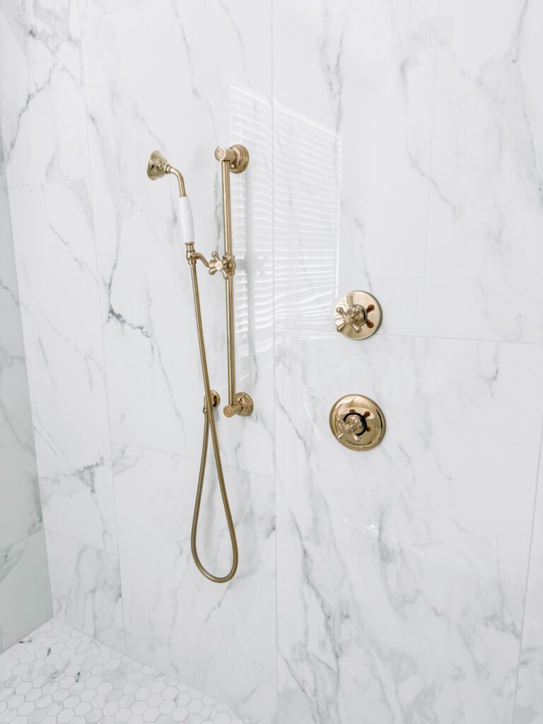Modern Glam Luxury Bathroom Shower, Large Format Porcelain Tile and Polished Brass Vintage Hand Shower