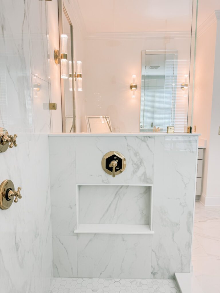 Modern Glam Luxury Bathroom Shower, Large Format Porcelain Tile, Large Hidden Shower Niche and Polished Brass Vintage Fixture hardware